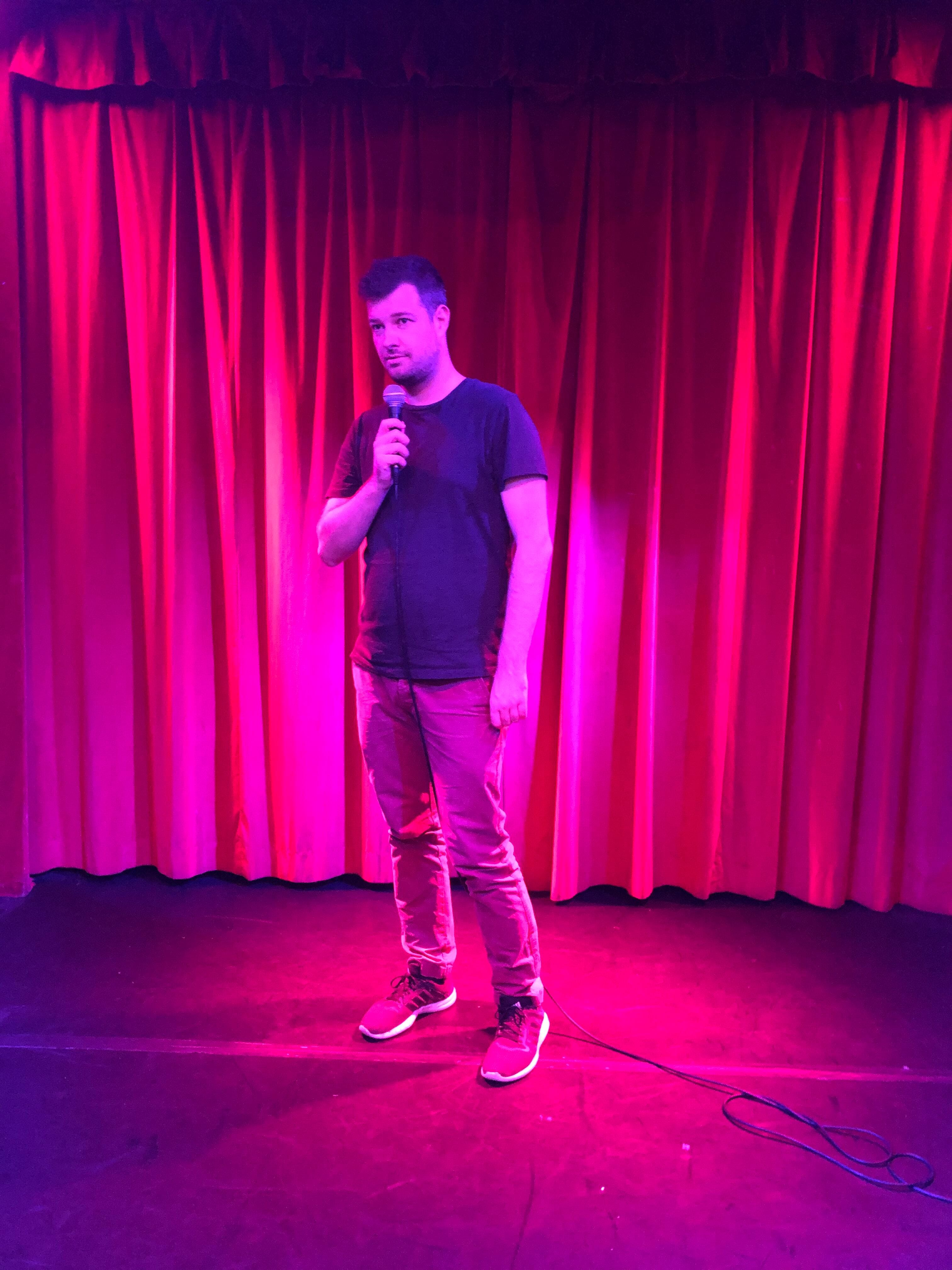 Me on stage at my first standup gig. It was a long road to get here, but it didn't have to be.